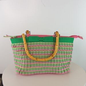 And pink plaid ruffled zip top handbag with faux w